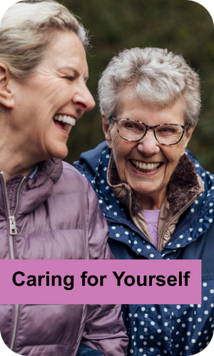 An image of 2 women laughing